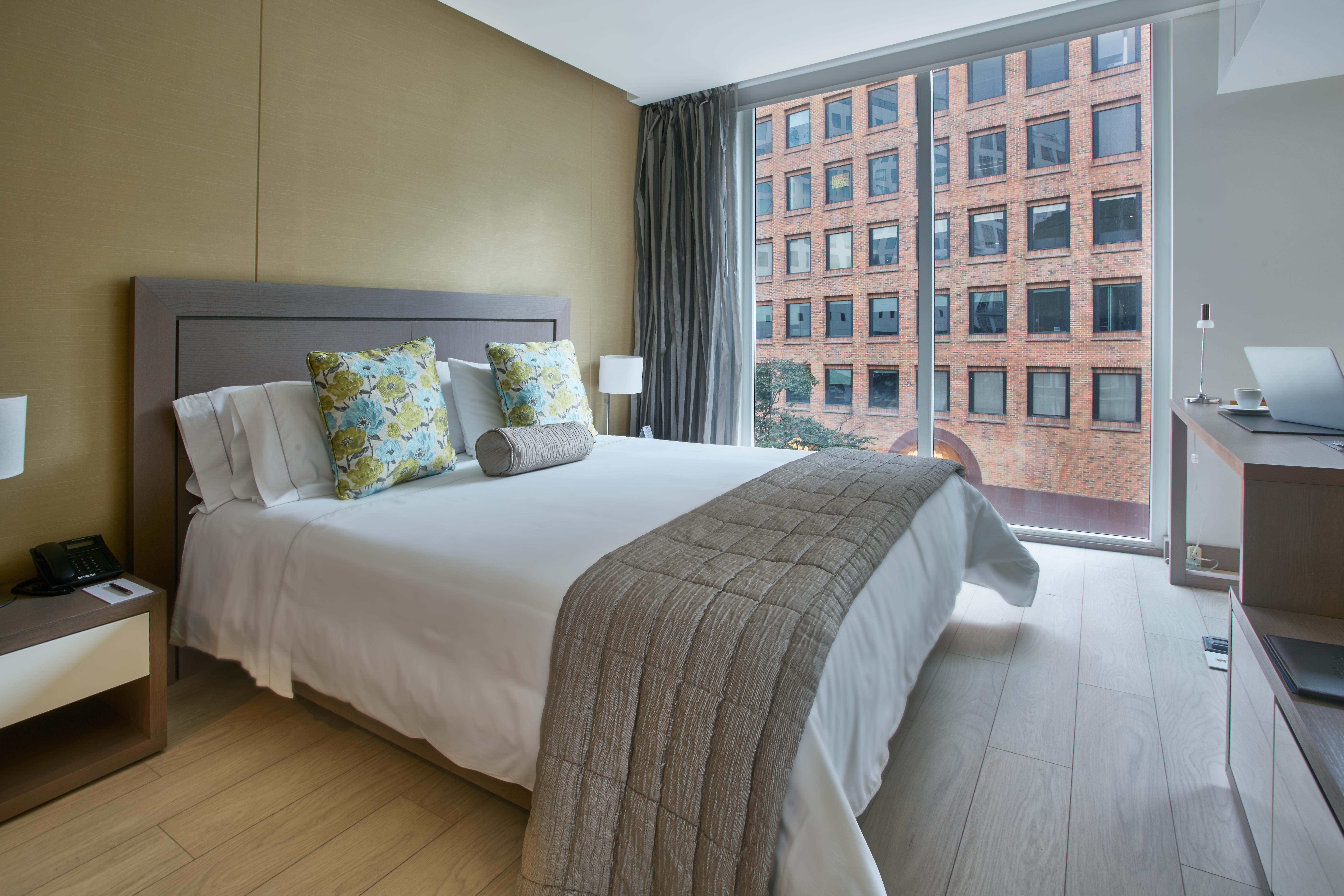 Hotel 100 Luxury Suites By Preferred Bogota Luaran gambar A bedroom at the hotel