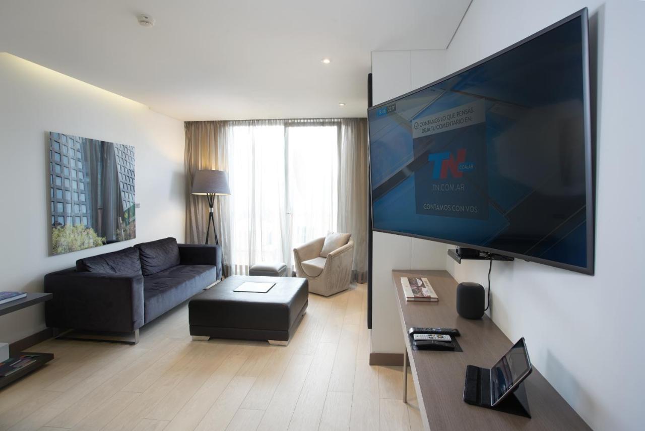 Hotel 100 Luxury Suites By Preferred Bogota Luaran gambar A television set in a hotel room